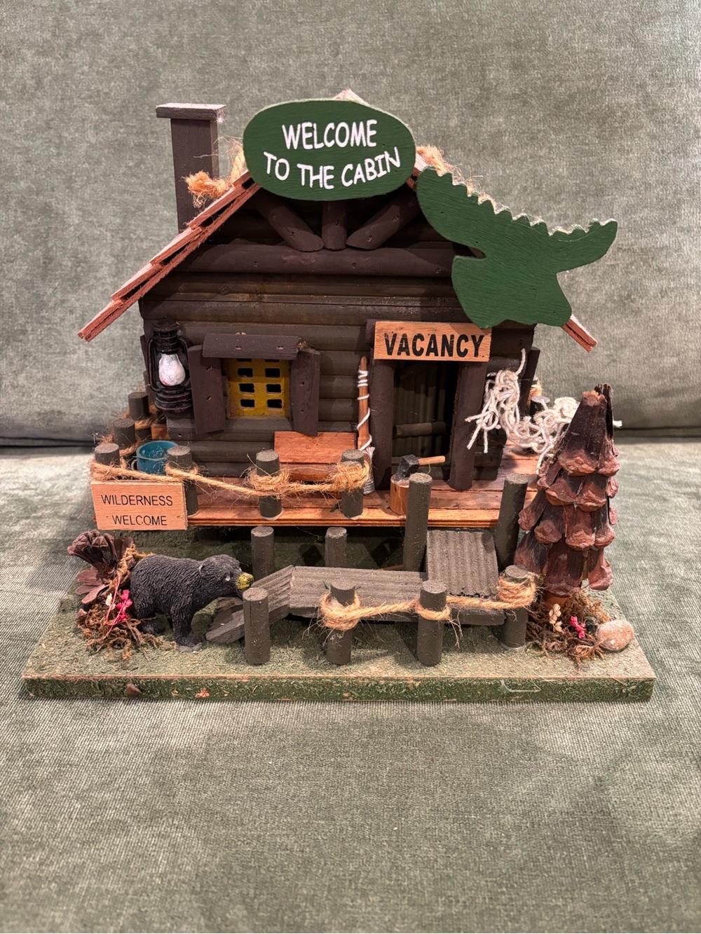 Decorative “Welcome to the Cabin” rustic birdhouse